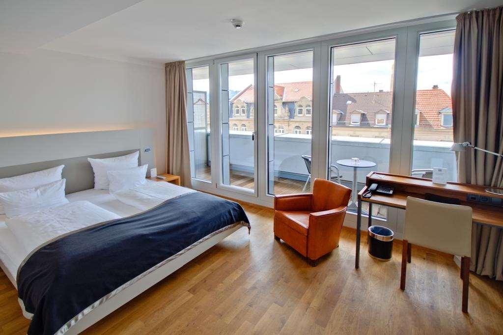 היידלברג Qube Hotel Bahnstadt חדר תמונה